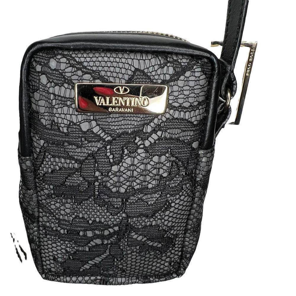 NWT Valentino Garavani lace mini bag. Valentino logo outside. Zipper on top. 3x4